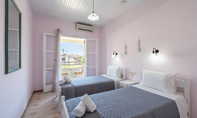 Roda Apartment | Apartment 'Alexandros Studios 10' with Shared Pool, Wi-Fi and Air Conditioning