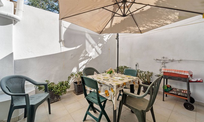 Iglesias Apartment | Cozy Apartment 'Amelia' with Private Garden & Free Wi-Fi