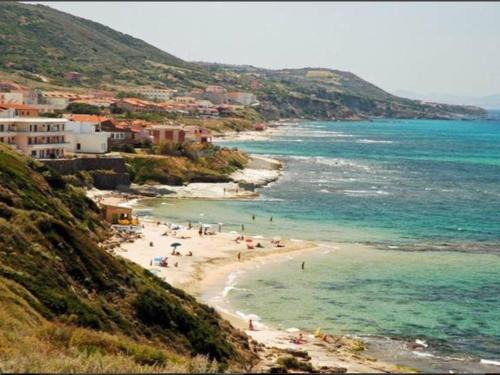 Lu Bagnu Apartment | Cozy Apartment Arianna: Steps from Beach with Ocean Views