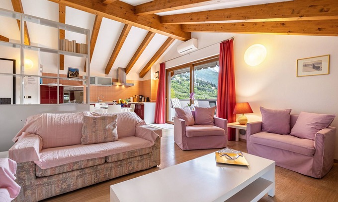 Torbole sul Garda Apartment | Attic Rosa: Private Terrace & Mountain Views Await You