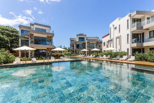Poste Lafayette Apartment | Beachfront Ocean Terraces: Guest Rated 9.4 with Pool Access