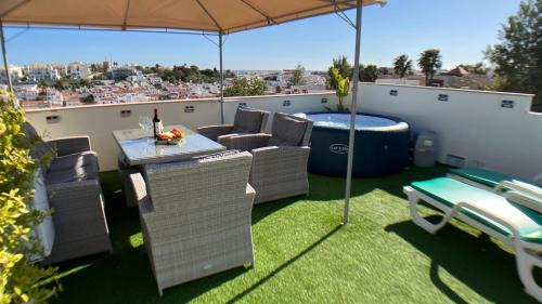 Ferragudo Apartment | Modern Apartment Beta with Rooftop Hot Tub and Ocean View