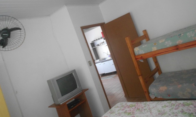 Enseada Apartment | Apartment facing the sea, holds up to 8 people.