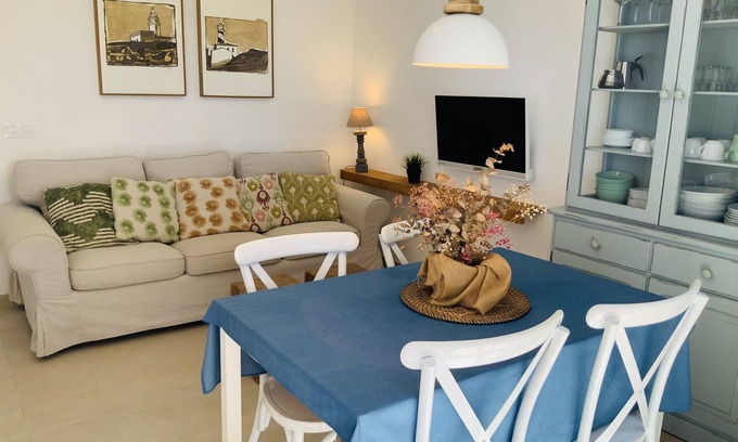 Son Xoriguer Apartment | Renovated Oceanfront Apartment Steps from the Beach