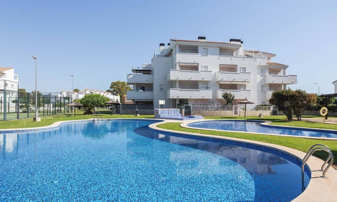 Les Deveses Apartment | Apartment 'Entre Olas 2' with Shared Pool, Private Terrace and Air Conditioning