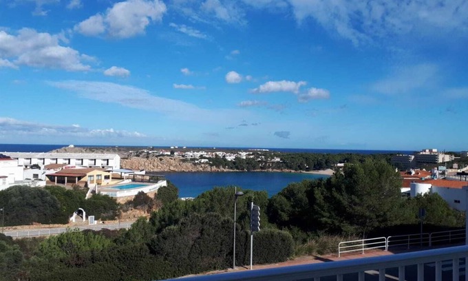 Arenal d'en Castell Apartment | Cozy Beachfront Apartment with Stunning Ocean Views