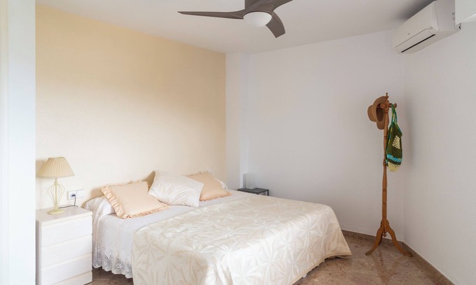 Els Arenals del Sol Apartment | Beachfront Apartment with Pool, Gym & Parking Available