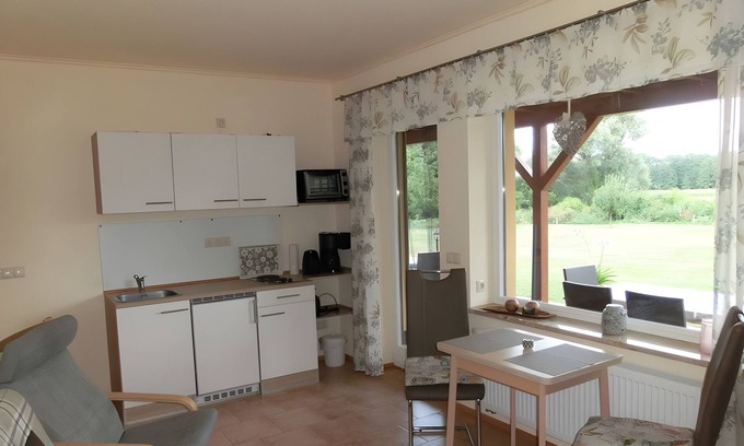 Muritz Apartment | Apartment 'Federower Hofsee Fischadler' with Lake View, Private Terrace and Wi-Fi