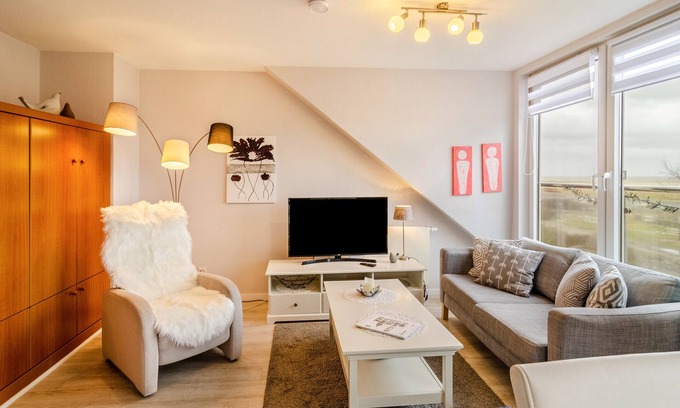 Norderney House | Oceanfront Apartment 'Ferienhaus Raschke' with Private Terrace