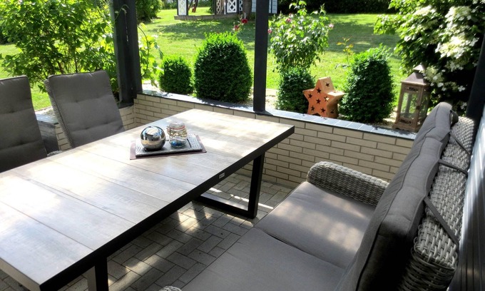 Wolfshagen Apartment | Spacious Living Room with Kitchen and Accessibility Features
