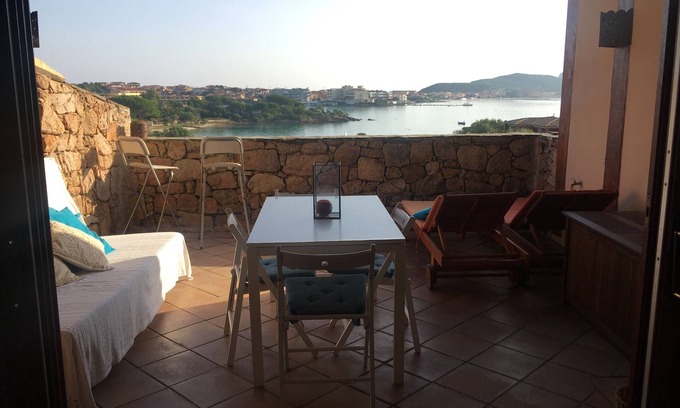 Baia Caddinas House | Elegant Oceanfront Apartment in Golfo Aranci with Pool