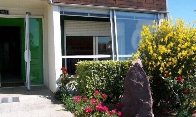 Courseulles-sur-Mer Apartment | Oceanfront Apartment for 6 with Pool & Breakfast Included