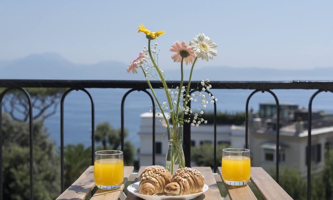 Posillipo House | Family-Friendly Apartment for 8 with Bay Views & Amenities