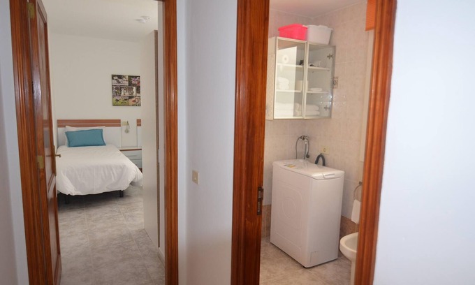 Playa de Arinaga Apartment | Business and Holiday Retreat with Oceanfront View & Spa