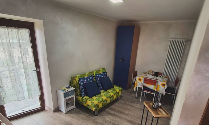 Cino Apartment | Apartment 'Girasole' with Mountain View, Private Garden and Wi-Fi