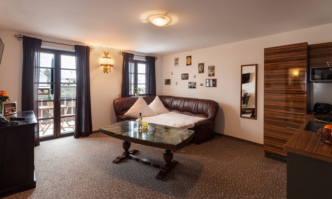 Hopfen am See Apartment | Inviting Guinness Suite at Vitusfort House with Pool Access