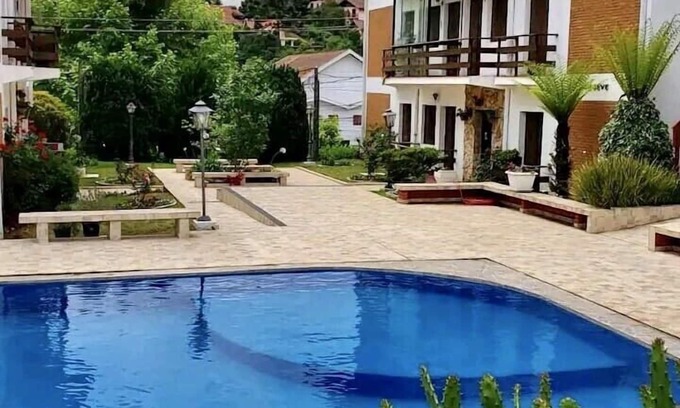 Campos do Jordao Apartment | Ideal Apartment Steps from Capivari with Pool & Breakfast