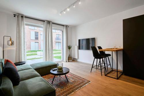 Mouvaux Apartment | Modern Apartment with Parking - Family-Friendly Stay!