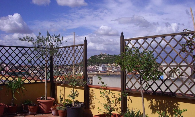 Province of Cagliari Apartment | Cozy Attic Apartment with Spa & Breakfast Amenities