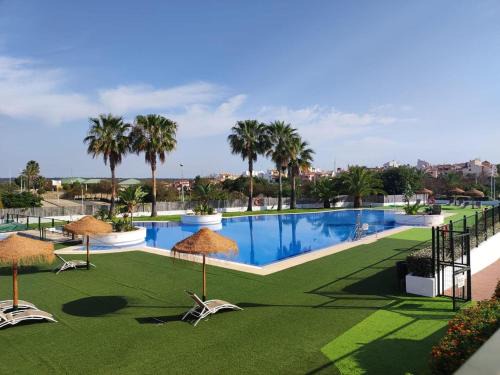 Costa Esuri Apartment | Stylish Ayamonte Apartment with Private Terrace & Pool