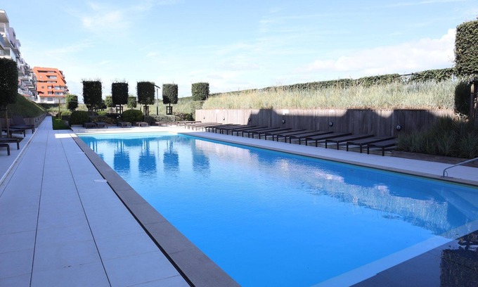 Nieuwpoort-Bad Apartment | Capricia 0406: Oceanfront Retreat with Pool & Breakfast