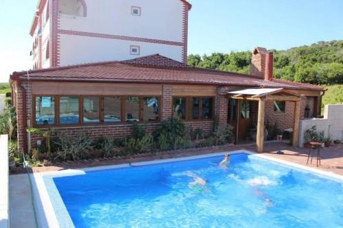 Caska Apartment | Sea View Apartment in Novalja with Pool and Terrace