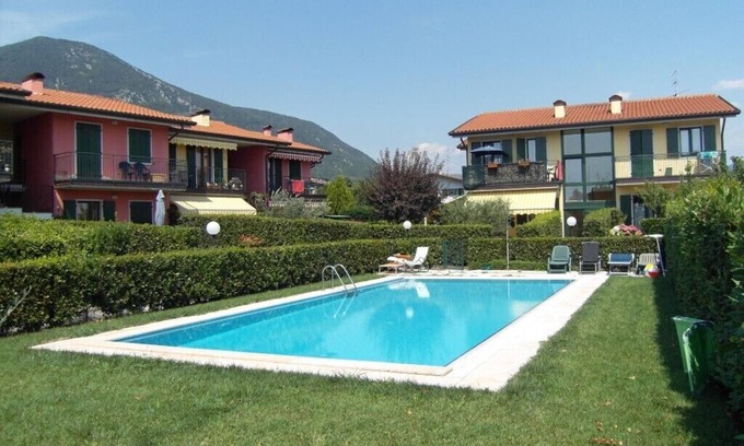 Caprino Veronese Apartment | Inviting Apartment with Pool & Private Garden Retreat