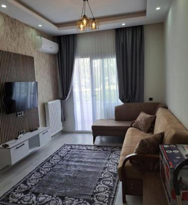 Mezetli Apartment | Modern City Apartment: Pet & Child Friendly Retreat