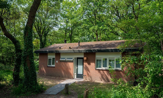 Krachtighuizen House | Cozy Bungalow with Fireplace near the Veluwe