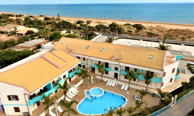 Ispica Apartment | Top-Rated Belvilla by OYO: Poolside Oceanfront Retreat