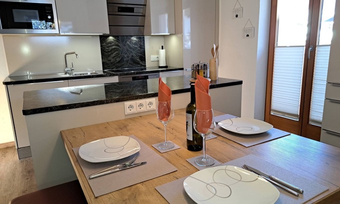 Finkenberg Apartment | Serene Lake View Retreat at Leon by Interhome