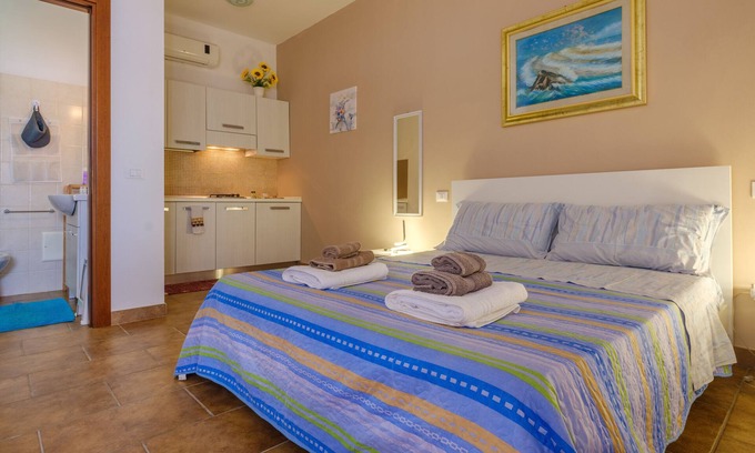 Borgagne Apartment | Relax at Mamba House 3: Private Terrace & Oceanfront Views