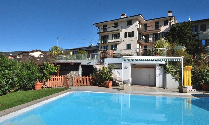 Costermano Apartment | Relaxing Apartment Montegolo Four with Pool & Lake Views