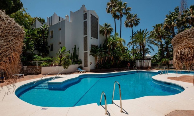 Urbanizacion Hacienda las Chapas Apartment | Beachfront Apartment with Ocean Views in Marbella