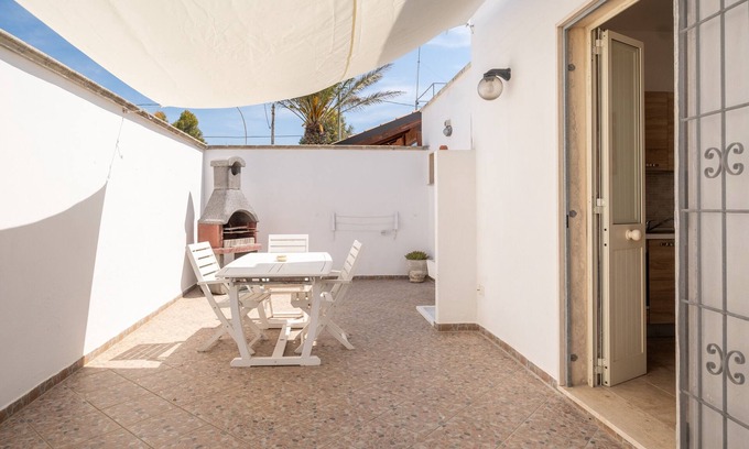 Sant'Isidoro Apartment | Relaxing Apartment 'Oasi Del Conte' with Ocean View Terrace