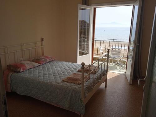 Spata-Artemida Apartment | Beachfront Apartment with Ocean View & Family-Friendly Vibes