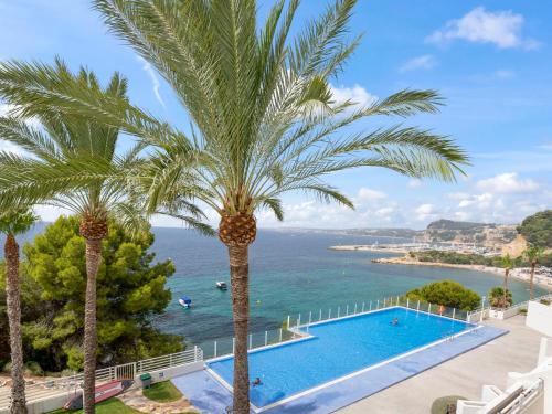 Pueblo Mascarat Apartment | Scenic Apartment Panorama by Interhome with Ocean Views