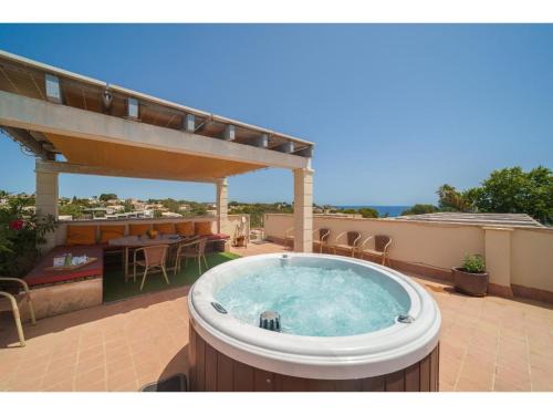 Cala Anguila-Cala Mendia Apartment | Top-Rated Oceanfront Penthouse with Pool & Hot Tub