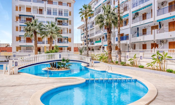 La Mata Apartment | Relax at Playa La Mata: Pool, Ocean Views & Free Wi-Fi