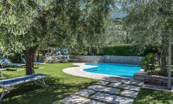 Malcesine Apartment | Mountain View Apartment with Pool, Wi-Fi & Spa Amenities