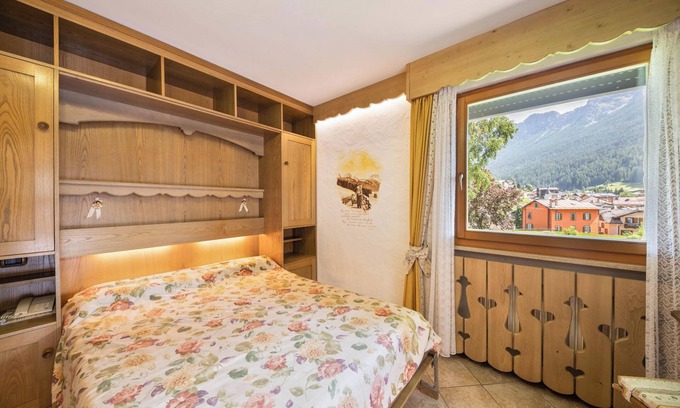 Moena Apartment | Mountain View Apartment with Garden, Wi-Fi & Balcony