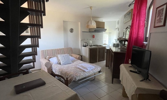 Giomici Apartment | Cozy Split-Level Apartment Soffitta for 2-3 Guests