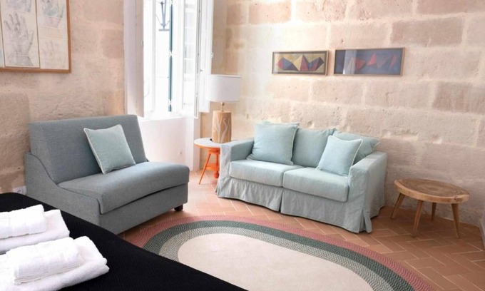 Mahon Apartment | Suite 1: Oceanfront Apartment with Wi-Fi and Spa Access