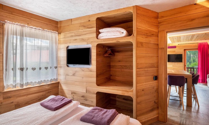 Pie Falcade Apartment | Mountain View Apartment 'Tana Del Picchio Rosso' with Spa