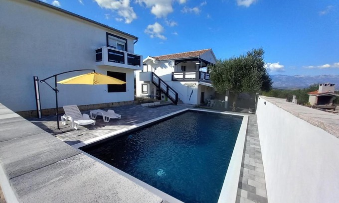 Podgradina Apartment | Modern Apartment with Pool and Mountain Views by the Sea