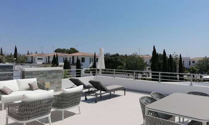 Mazotos Apartment | Modern Apartment with Balcony and Oceanfront Views