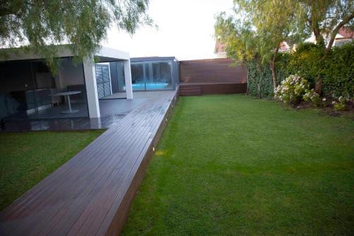 Cascais Apartment | Relaxing Apartment with Garden, Pool & Ocean Views