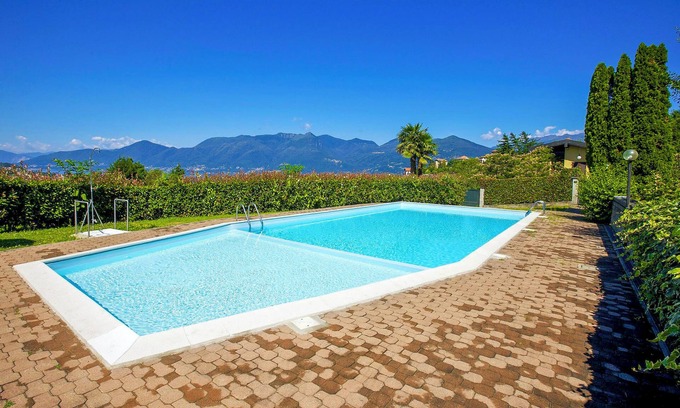 Luino Apartment | Cozy Apartment with Garden Terrace and Pool Access