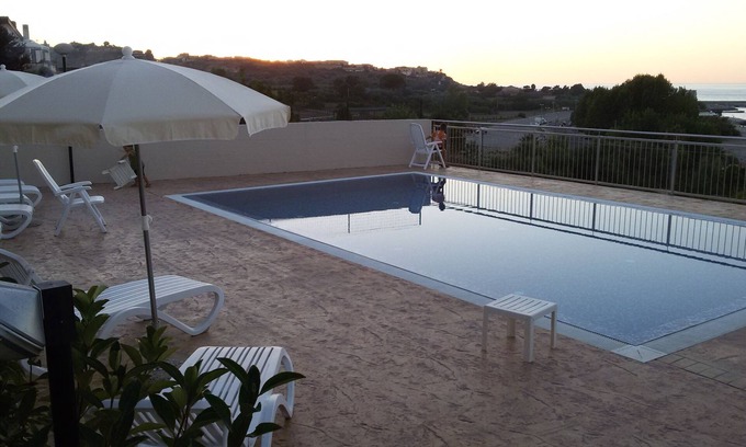 Localita Piana di Vadi Apartment | Poolside Apartment Steps from the Ocean with Stunning Views