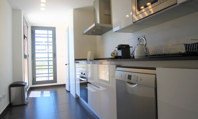 Playa de San Juan Apartment | Relaxing Apartment with Pool and Parking at San Juan Playa